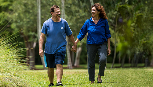 Marc and wife walking in park