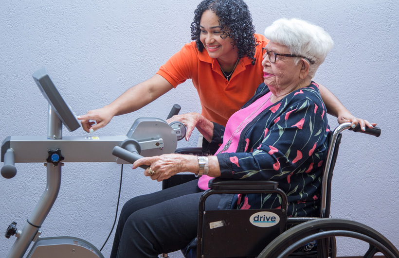 Therapist with elderly patient